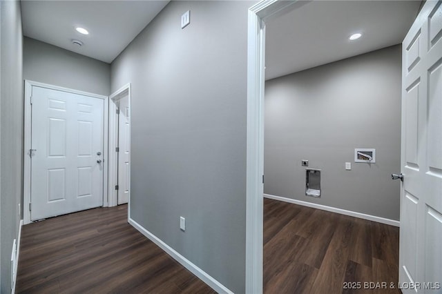 hallway featuring dark wood-type flooring