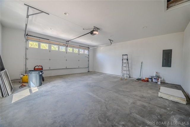 garage with electric panel and a garage door opener