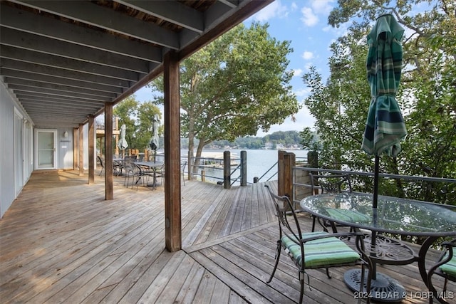 deck featuring a water view