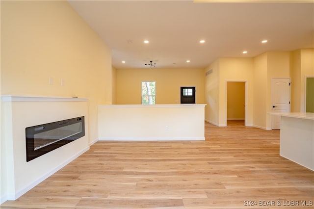 unfurnished living room featuring light hardwood / wood-style flooring