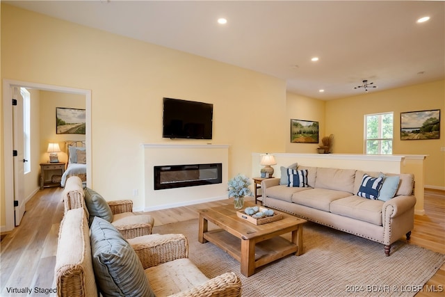 living room with light hardwood / wood-style floors