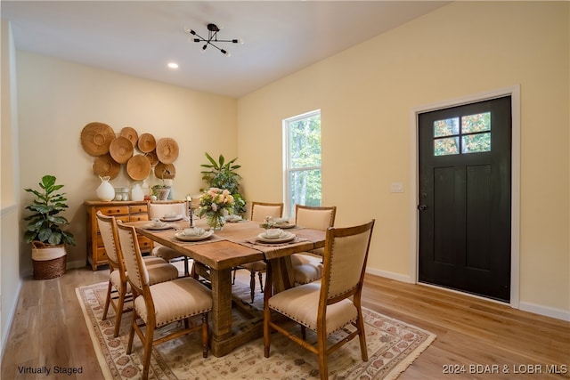 dining area featuring light hardwood / wood-style floors and plenty of natural light