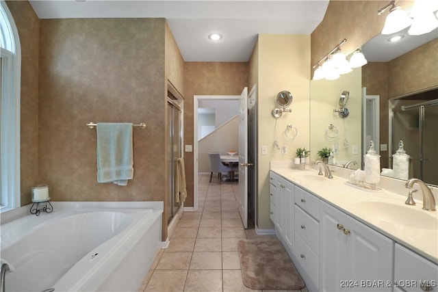 bathroom featuring tile patterned flooring, vanity, and independent shower and bath