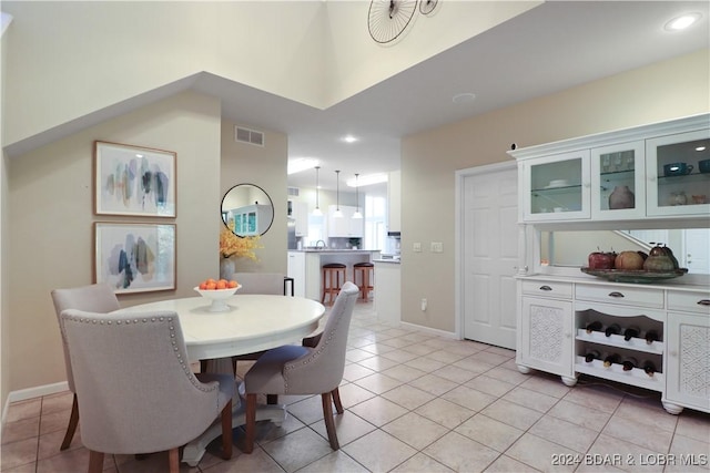 dining room featuring light tile patterned floors