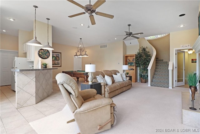 tiled living room with pool table and ceiling fan