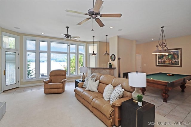 living room featuring pool table and light tile patterned floors