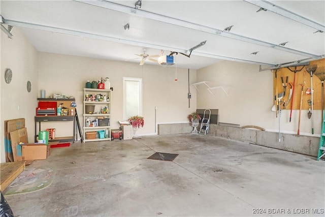 garage featuring a garage door opener