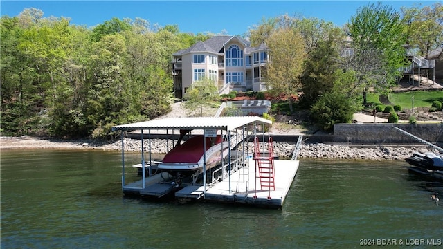 dock area with a water view