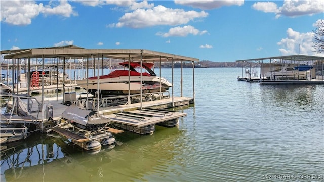 view of dock with a water view