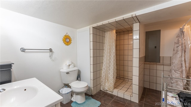 bathroom featuring walk in shower, vanity, and toilet