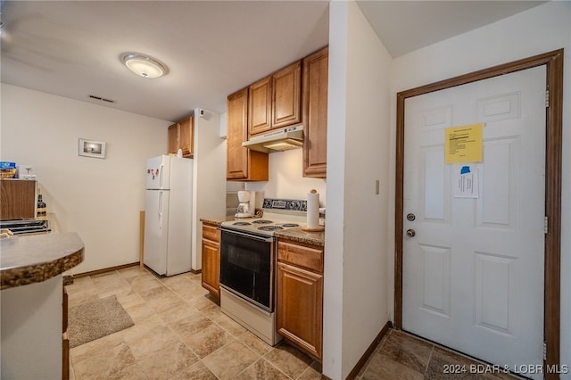 kitchen featuring white appliances