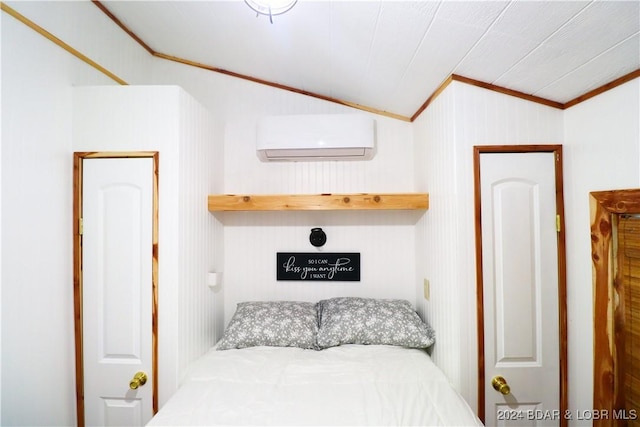 bedroom with ornamental molding, a wall unit AC, and lofted ceiling