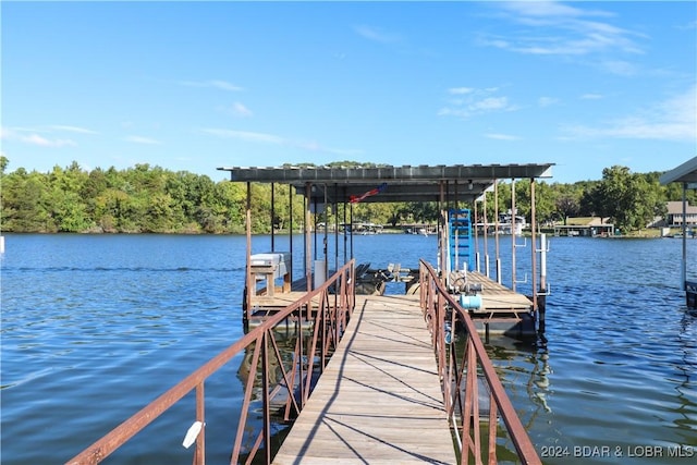 dock area featuring a water view