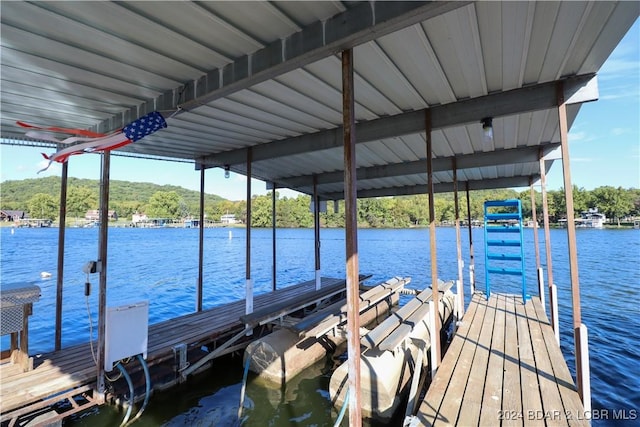 view of dock featuring a water view