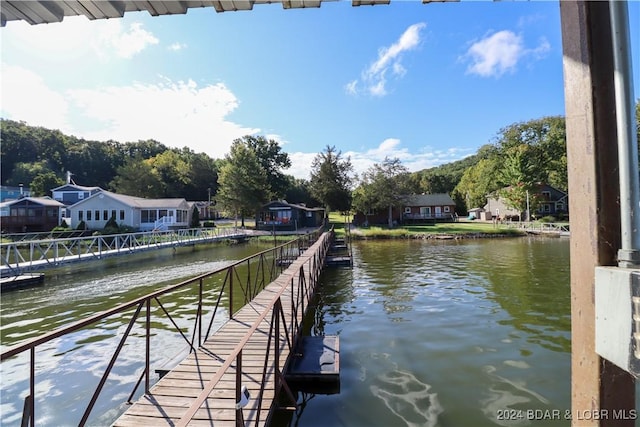 dock area featuring a water view