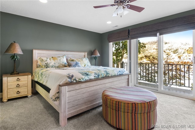 carpeted bedroom featuring access to outside and ceiling fan