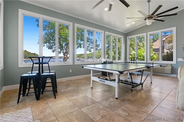 rec room with wooden ceiling, lofted ceiling, ceiling fan, and plenty of natural light