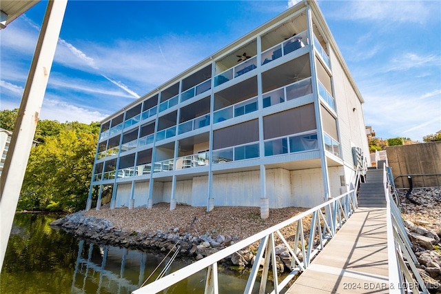 view of building exterior featuring a water view