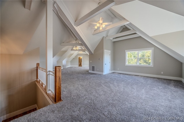 additional living space featuring vaulted ceiling with beams, carpet flooring, and ceiling fan