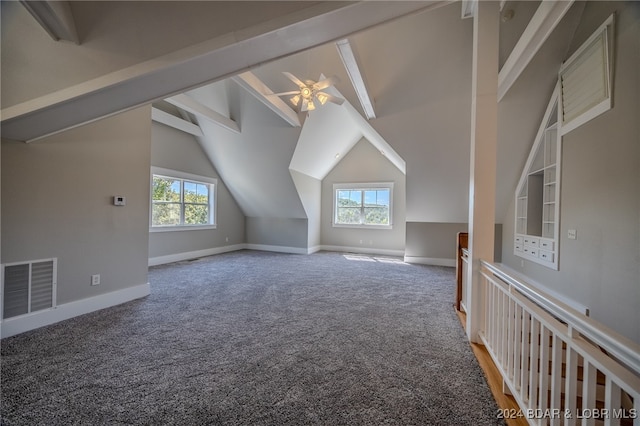 bonus room with carpet, lofted ceiling with beams, and plenty of natural light