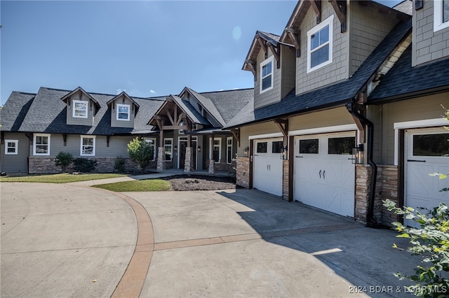 view of front of property featuring a garage