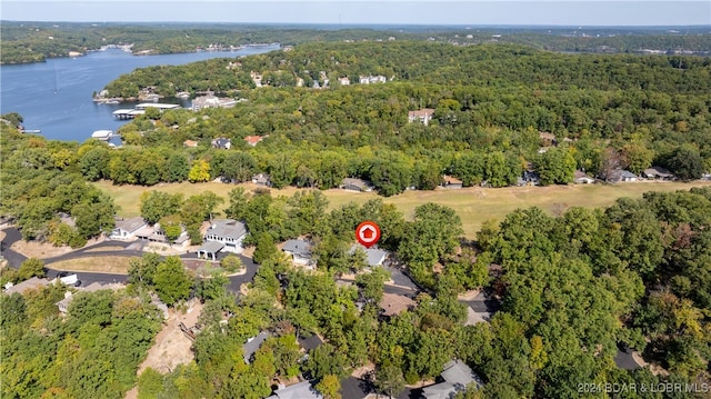 drone / aerial view with a water view