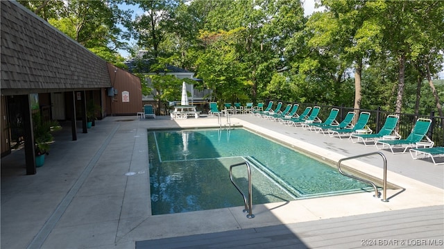 view of pool with a patio area