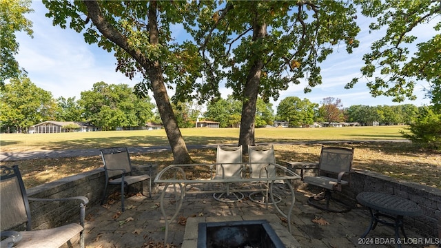 view of patio featuring a fire pit