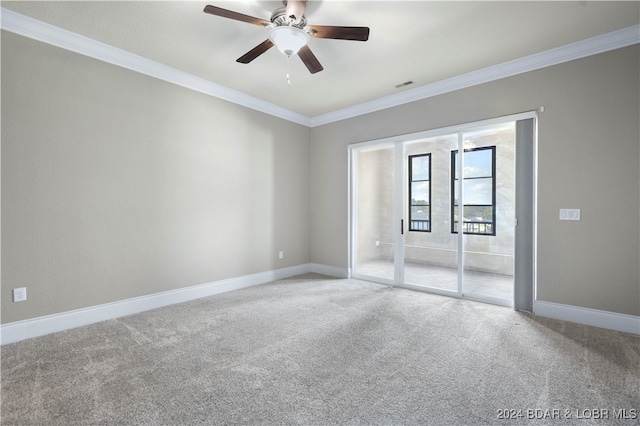 unfurnished room with carpet flooring, ornamental molding, ceiling fan, and french doors