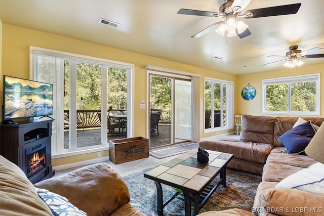 living room featuring ceiling fan