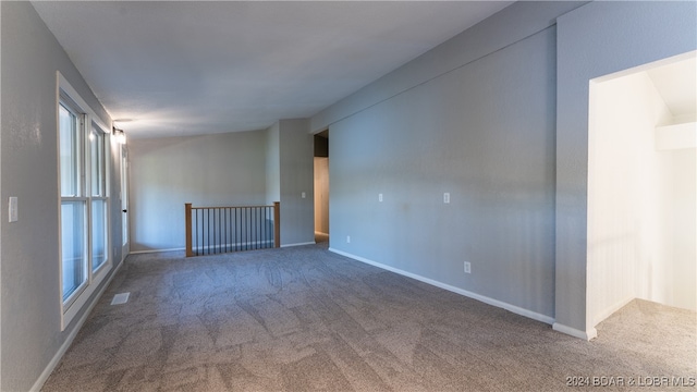 empty room featuring carpet floors