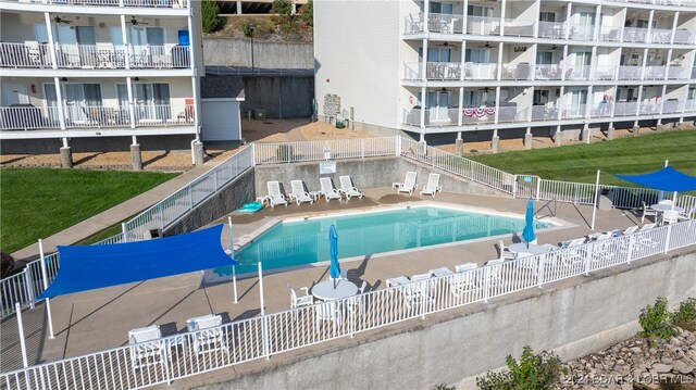 view of pool featuring a patio area