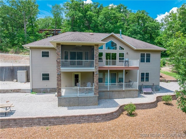 back of property with a patio