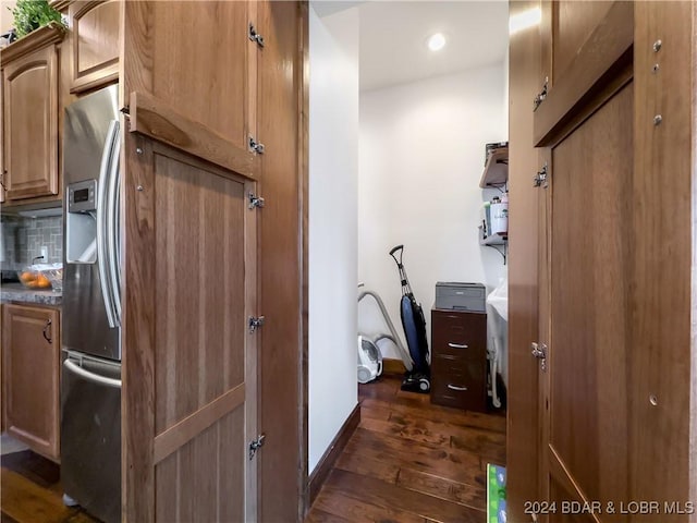 corridor featuring dark hardwood / wood-style floors