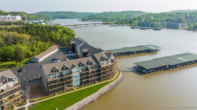 bird's eye view with a water view