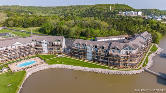 drone / aerial view with a water view