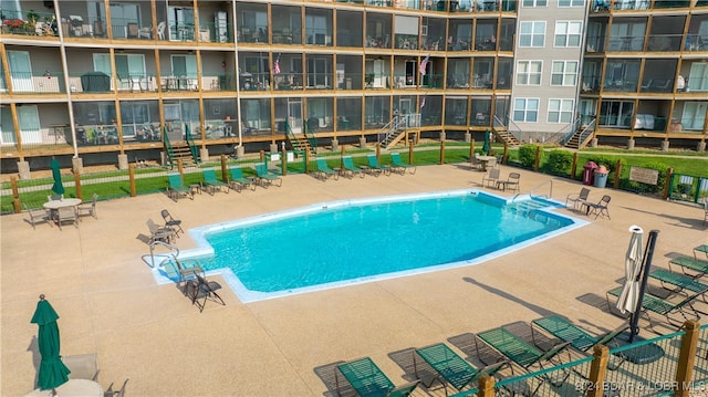 view of pool featuring a patio area