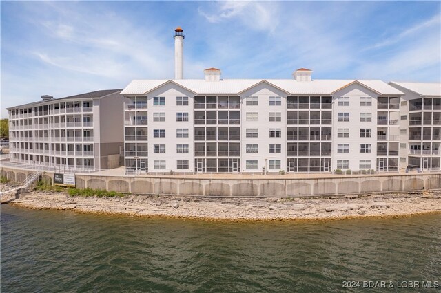 view of property with a water view