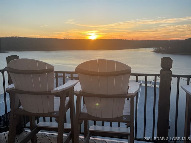 balcony at dusk with a water view