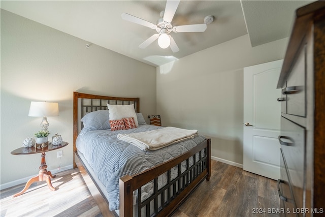 bedroom featuring ceiling fan and hardwood / wood-style flooring