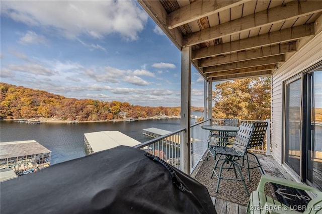 balcony featuring a water view