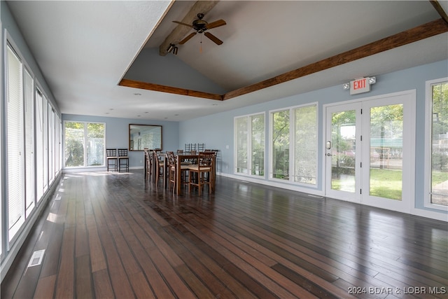 unfurnished sunroom featuring ceiling fan and lofted ceiling with beams