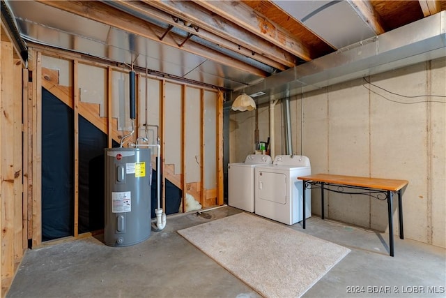 basement featuring washer and dryer and water heater