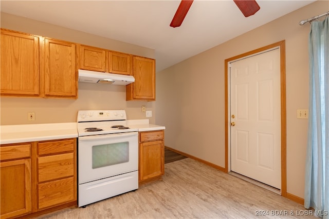 kitchen featuring ceiling fan, light wood-type flooring, and white electric stove