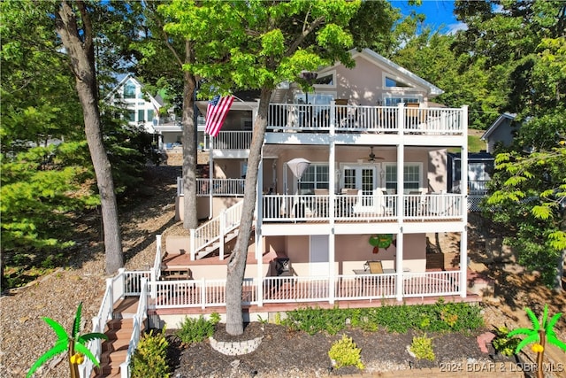 rear view of house with a balcony