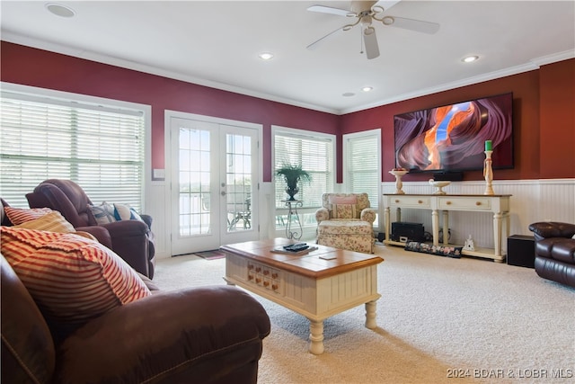 living room featuring light carpet, ceiling fan, plenty of natural light, and french doors