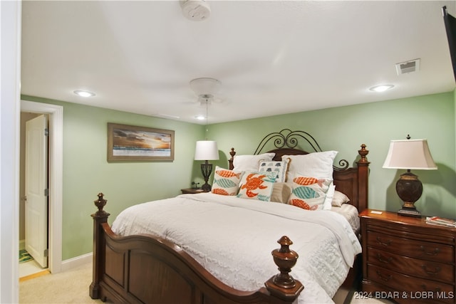 carpeted bedroom with ceiling fan