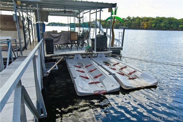 view of dock featuring a water view