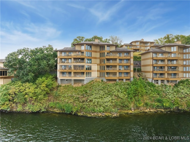 view of building exterior featuring a water view