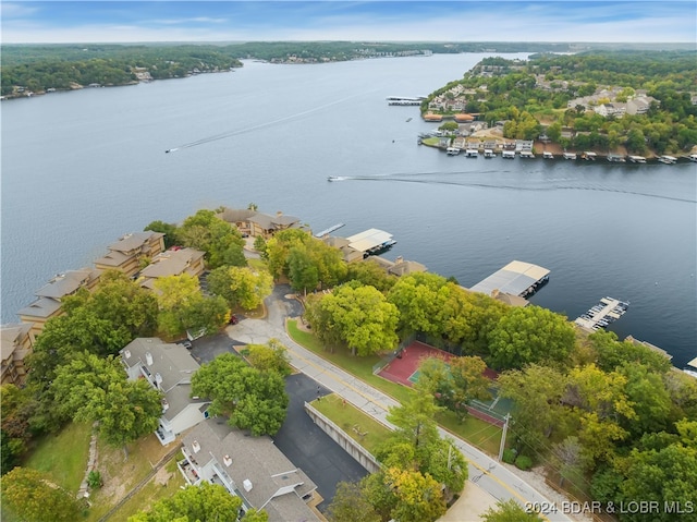 drone / aerial view with a water view